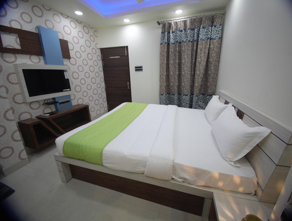 Hotel Arjun International Lucknow Room photo